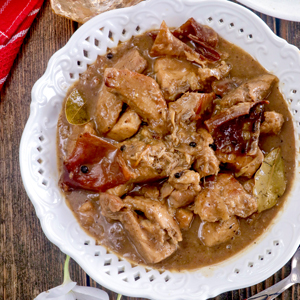 Paksiw na lechon made with leftover lechon simmered in vinegar, aromatics, and lechon sauce.