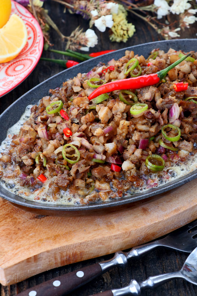 Sizzling sisig on a sizzling plate